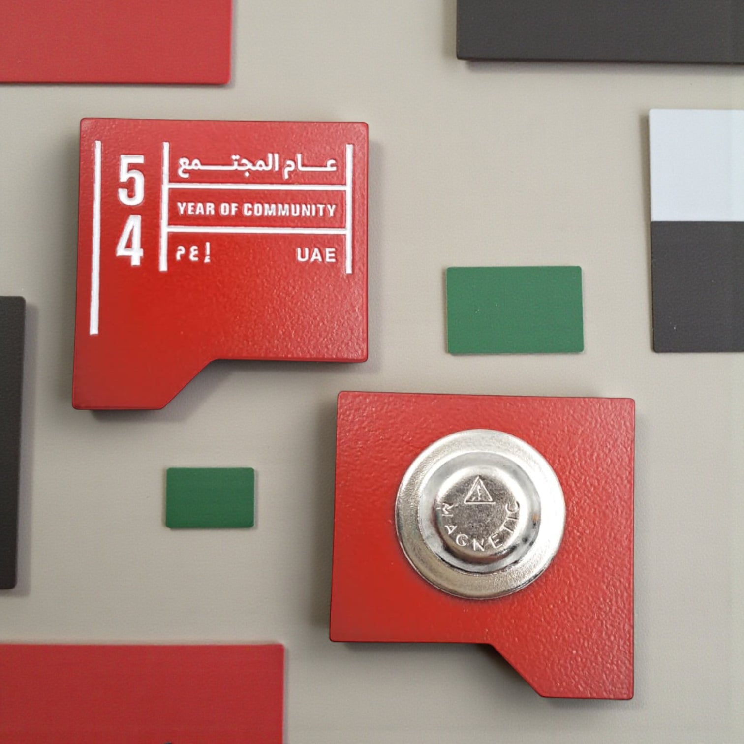 UAE Year of Community Magnetic Badge – Limited Edition Red Enamel Lapel Pin with Strong Magnet – “54 Year of Community” Design – Elegant Patriotic Accessory for National Day, Events & Gifts (H3cm x W3cm) - Damoo