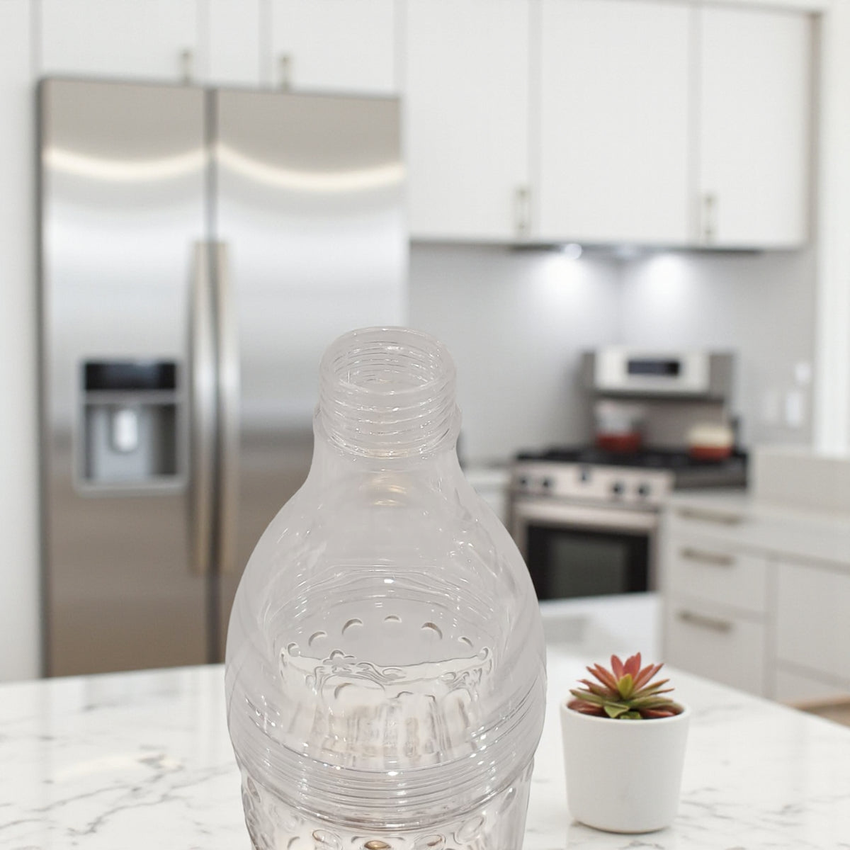 Luxury Clear Plastic Water Bottle with Gold Lid & Base – Reusable Textured Hydration Bottle for Home, Office, Gym & Travel – Elegant BPA-Free Design for Everyday Use - Damoo