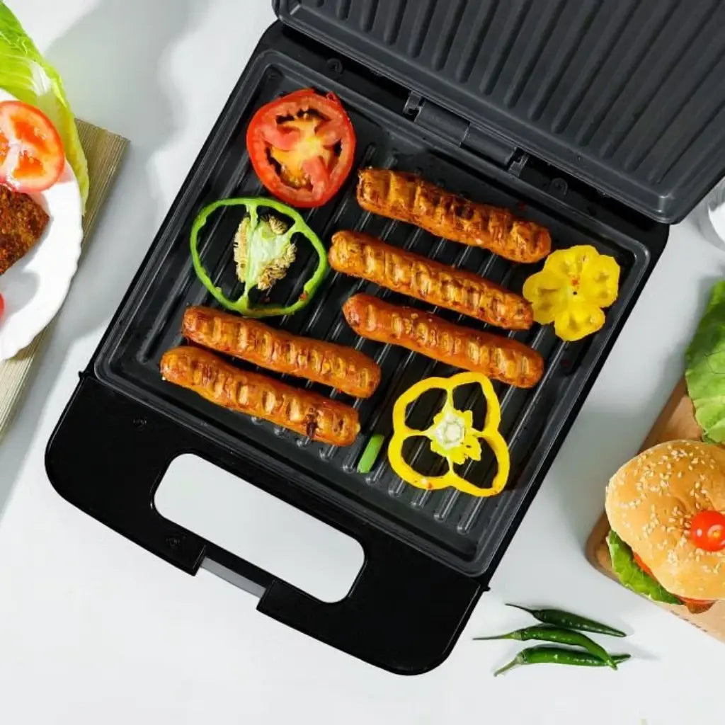 Geepas 4-Slice Electric Grill Maker GGT671 with Non-Stick Cooking Plates, 1400W , Cool Touch Handle, Power & Ready Indicator, Thermostat Control & Upright Storage – Stainless Steel Black Panini Press - Damoo
