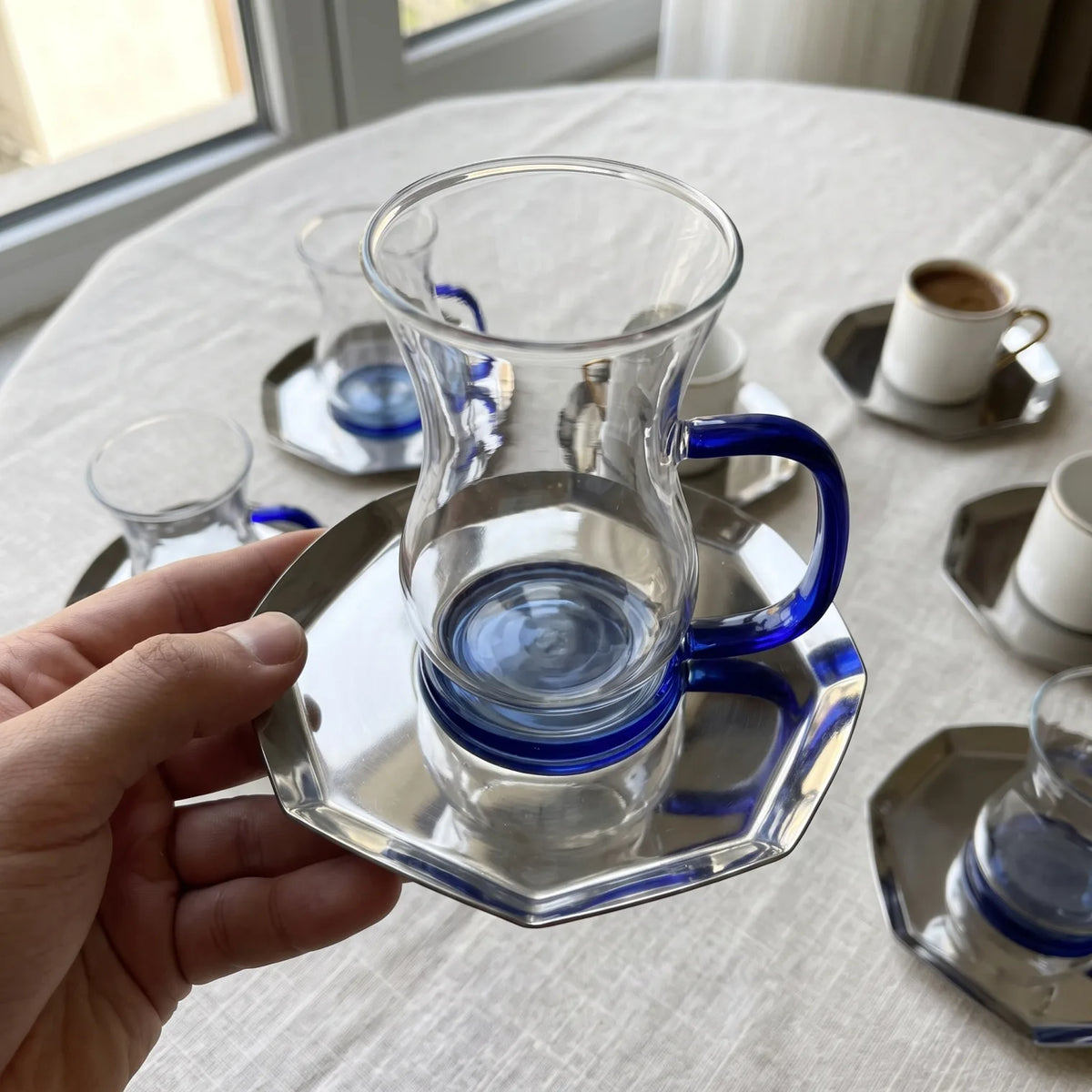 18-Piece Glass Tea & Coffee Set with Stainless Steel Saucers, Clear Cups, Dark Blue Accents & Serving Tray