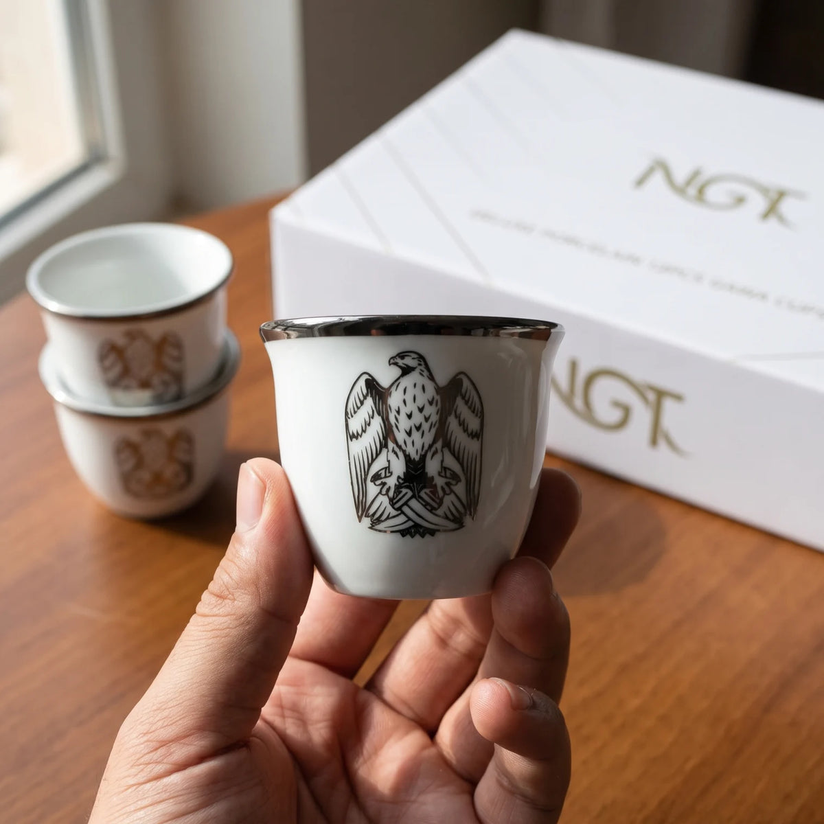 NGT 12-Piece Porcelain Arabic Coffee Gahwa Cup Set – UAE Abu Dhabi Falcon Logo | Handleless Cups | White-Gold or White-Black - White-Black - Image 3