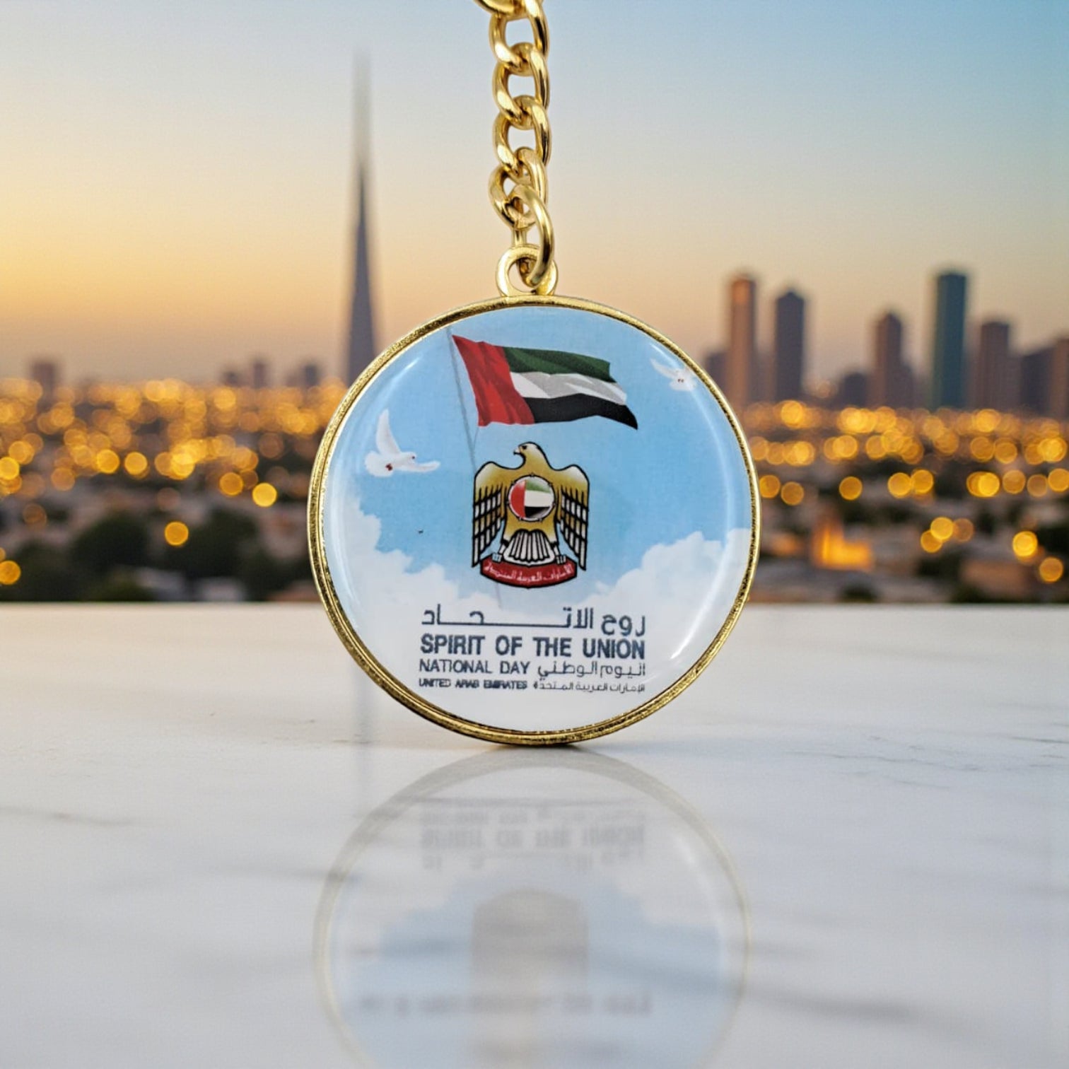UAE “Spirit of the Union” National Day Keychain – Round Gold Metal Key Ring with Flag & Emblem Design | Patriotic Souvenir Gift for UAE National Day, 9.5cm x 3.5cm - Damoo