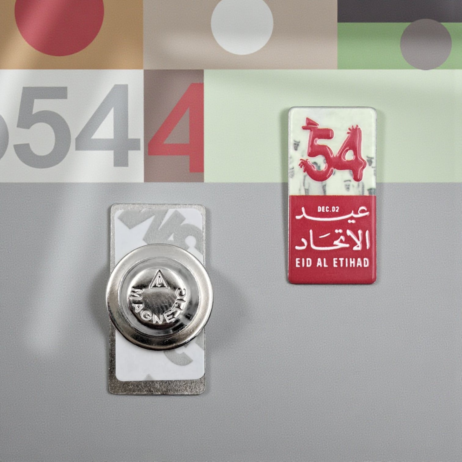 UAE 54th National Day Magnetic Pin – “Eid Al Etihad” Red & White Commemorative Badge with Arabic & English Design | H(3cm) x W(1.5cm) - Damoo
