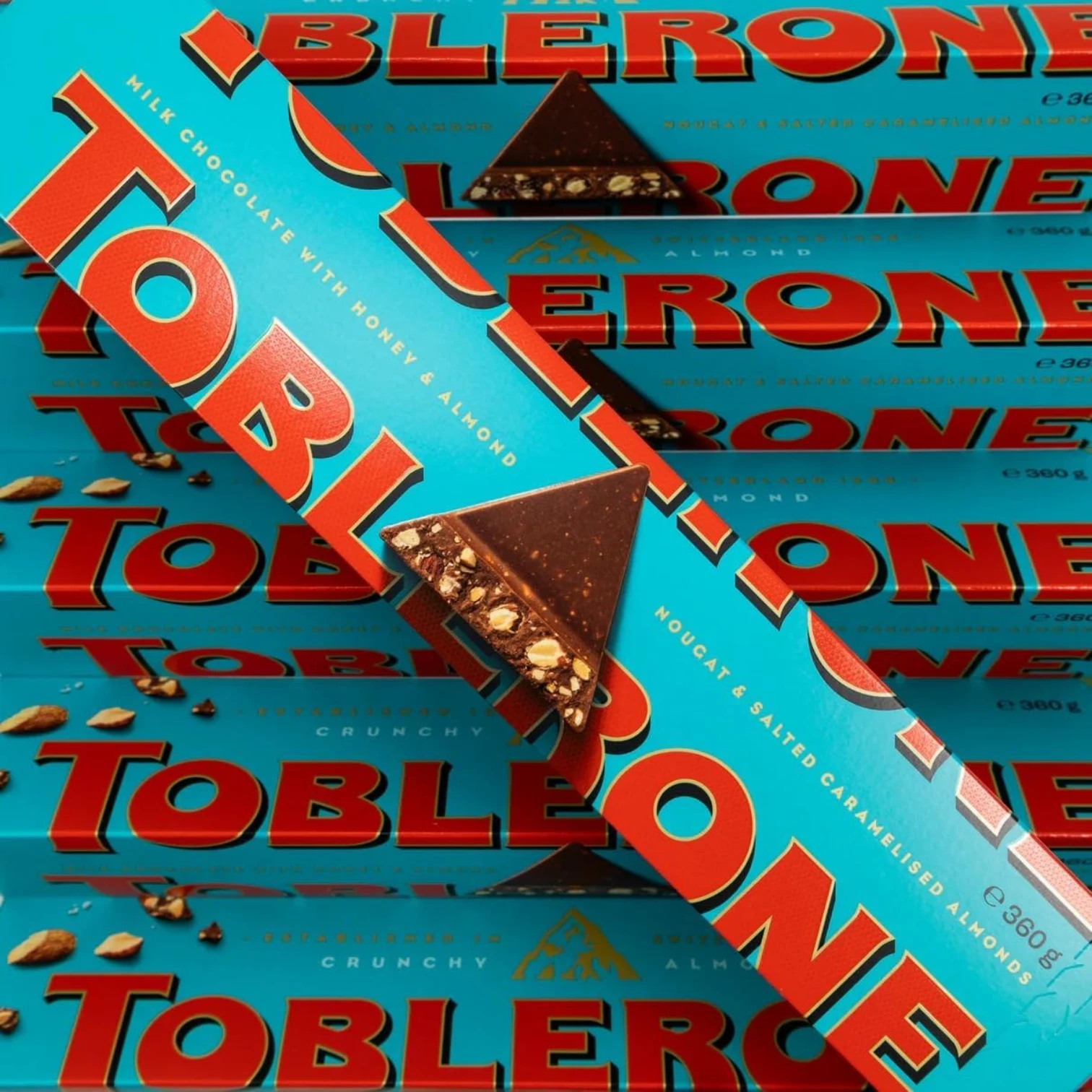 Toblerone Crunchy Almond Chocolate Bar 360g – Swiss Milk Chocolate with Caramelized Almonds & Honey-Almond Nougat | Zoom-In Edition, Large Gift Bar by Mondelez - Damoo