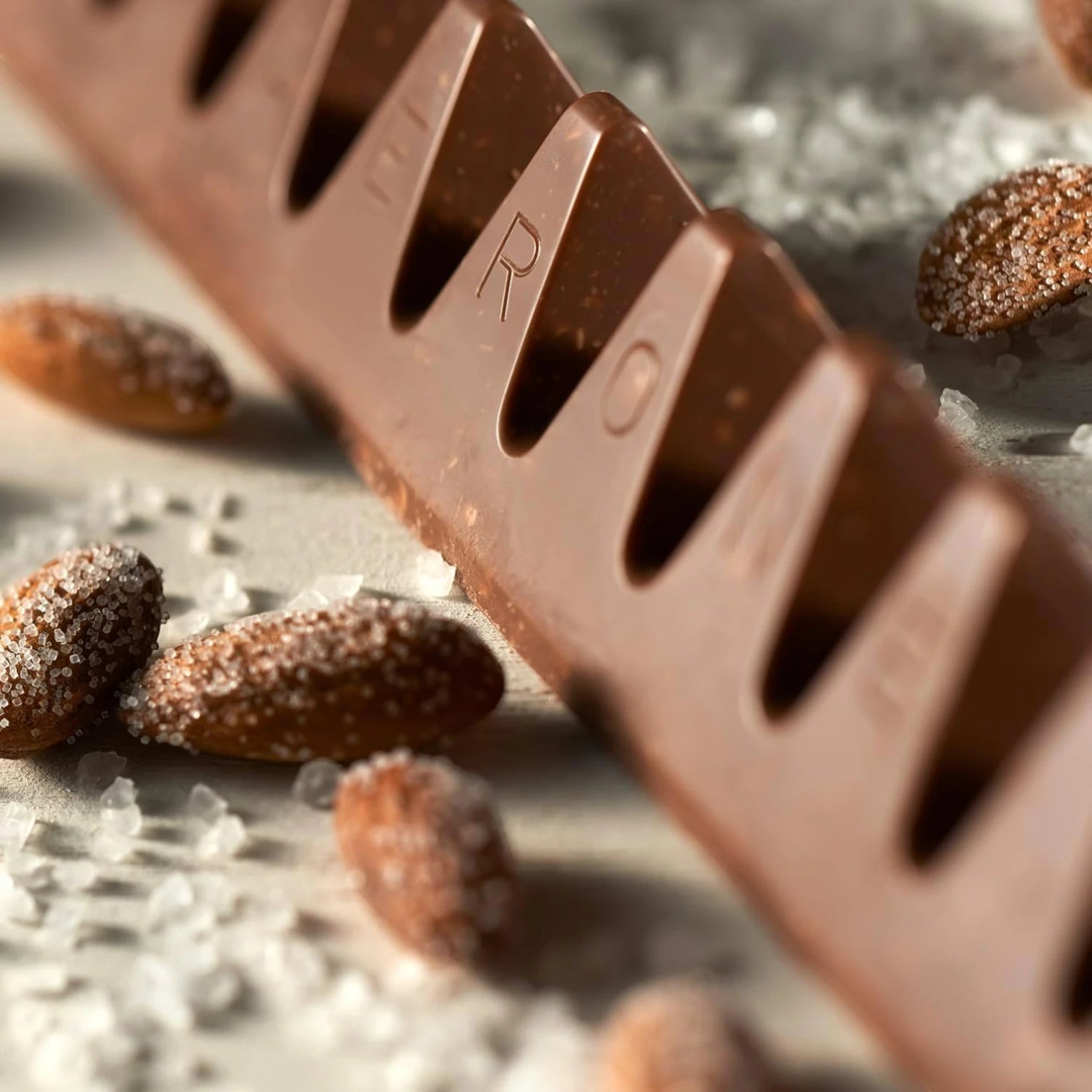 Toblerone Crunchy Almond Chocolate Bar 360g – Swiss Milk Chocolate with Caramelized Almonds & Honey-Almond Nougat | Zoom-In Edition, Large Gift Bar by Mondelez - Damoo