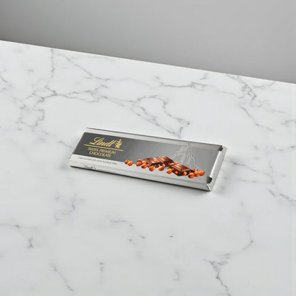 Lindt Swiss Premium Dark Chocolate Bar with Whole Roasted Hazelnuts, 300g – Gourmet Silver Pack, Intense Dark Chocolate, Vegetarian Gift Option - Damoo