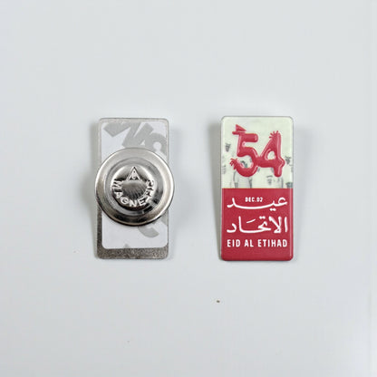 UAE 54th National Day Magnetic Pin – “Eid Al Etihad” Red & White Commemorative Badge with Arabic & English Design | H(3cm) x W(1.5cm) - Damoo