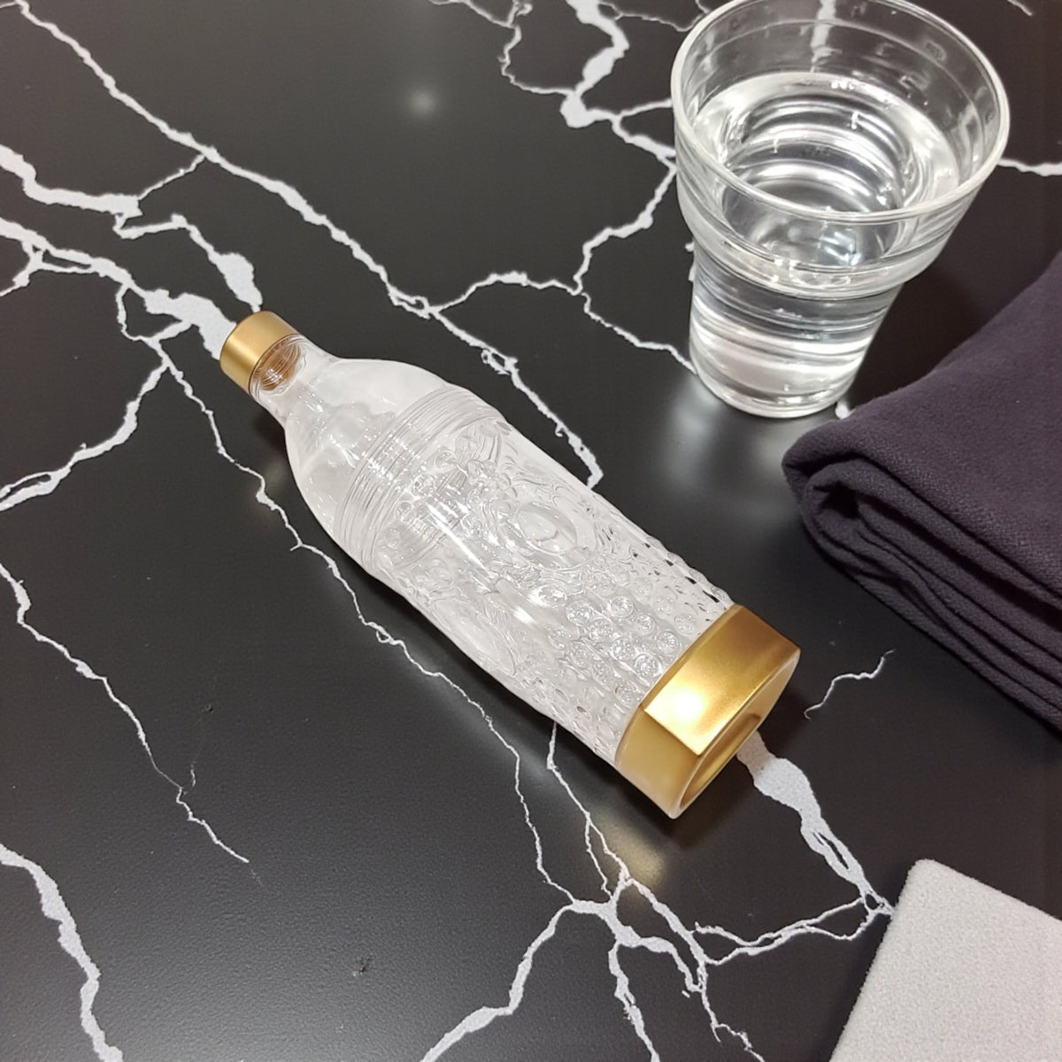 Luxury Clear Plastic Water Bottle with Gold Lid & Base – Reusable Textured Hydration Bottle for Home, Office, Gym & Travel – Elegant BPA-Free Design for Everyday Use - Damoo