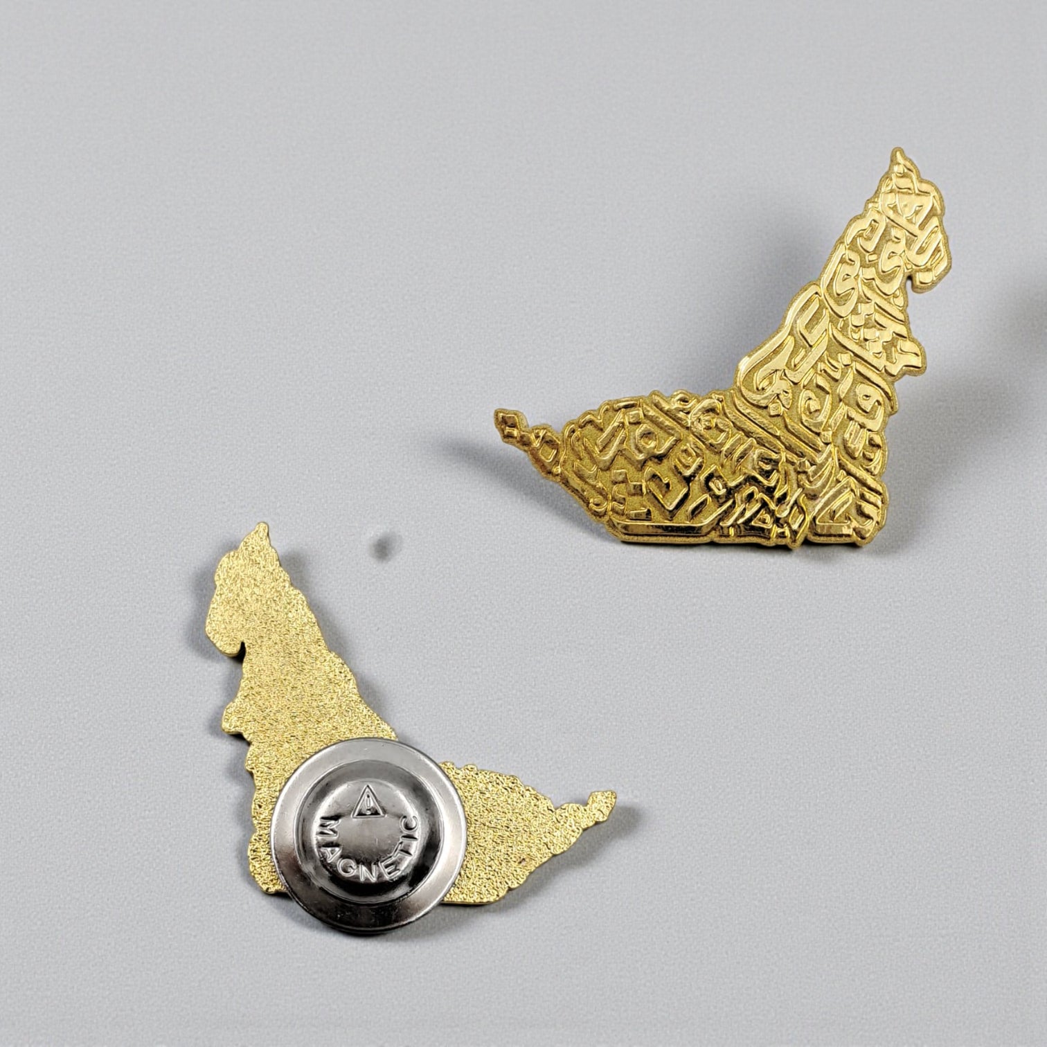 UAE Map Calligraphy Metal Badge – Elegant Golden Finish Pin with Arabic Script Design for National Day, Heritage Events, and Gifts - Damoo