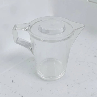Orchid Clear Creamer Pot with Lid – Elegant Transparent Serving Pitcher with Handle & Pouring Spout for Milk, Tea, Coffee & Sauces (14 x 9.5 x 12 cm) - Damoo