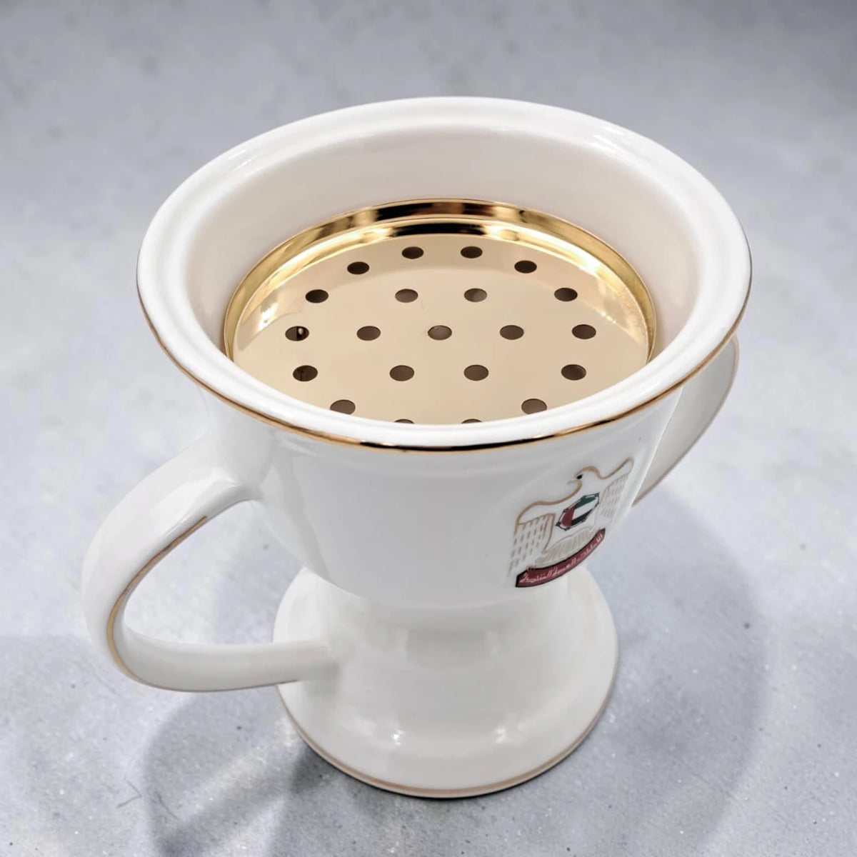 UAE National Emblem Double Handle Serving Cup with Gold Strainer Insert and Decorative Rim (13H x 16L x 12W CM) - Damoo