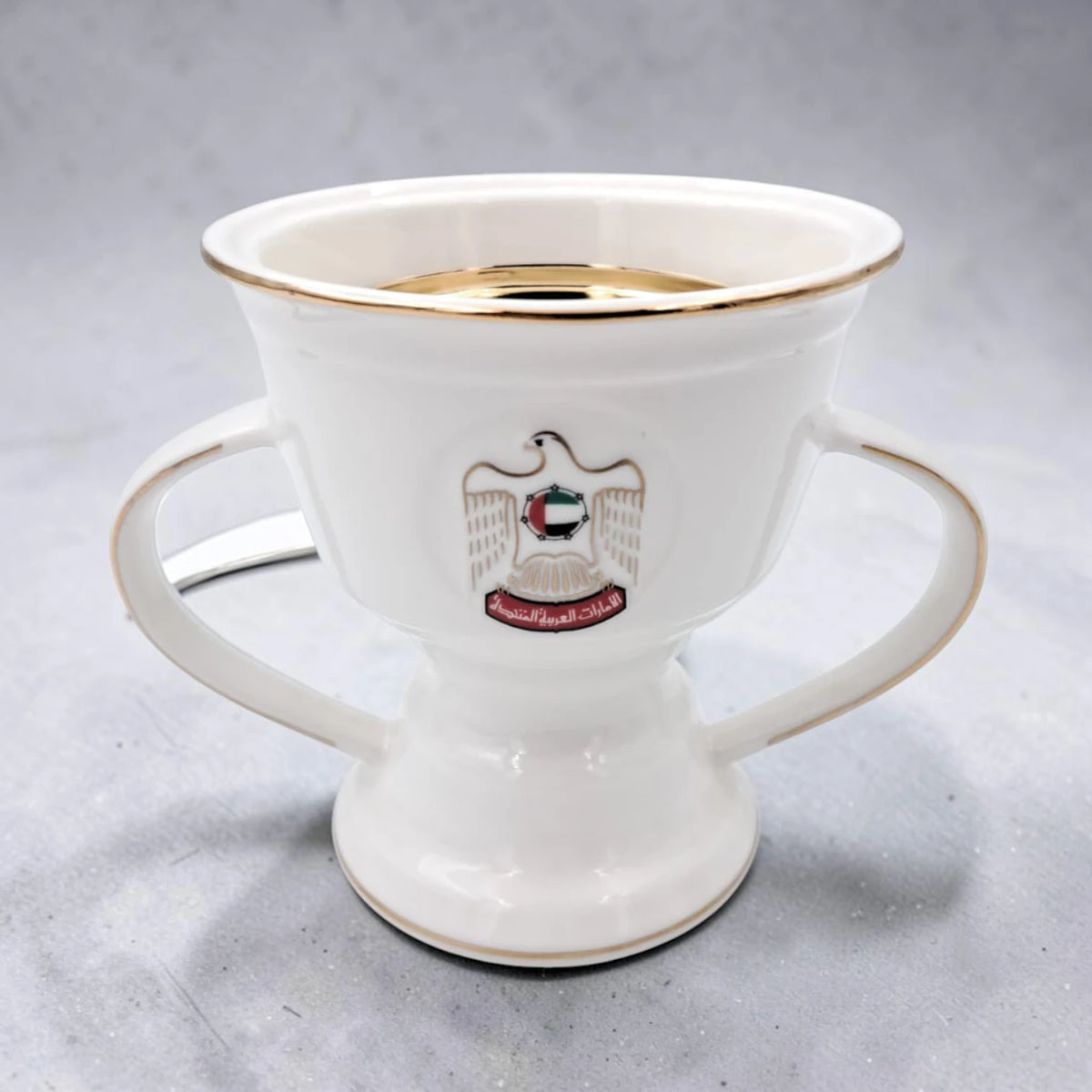 UAE National Emblem Double Handle Serving Cup with Gold Strainer Insert and Decorative Rim (13H x 16L x 12W CM) - Damoo