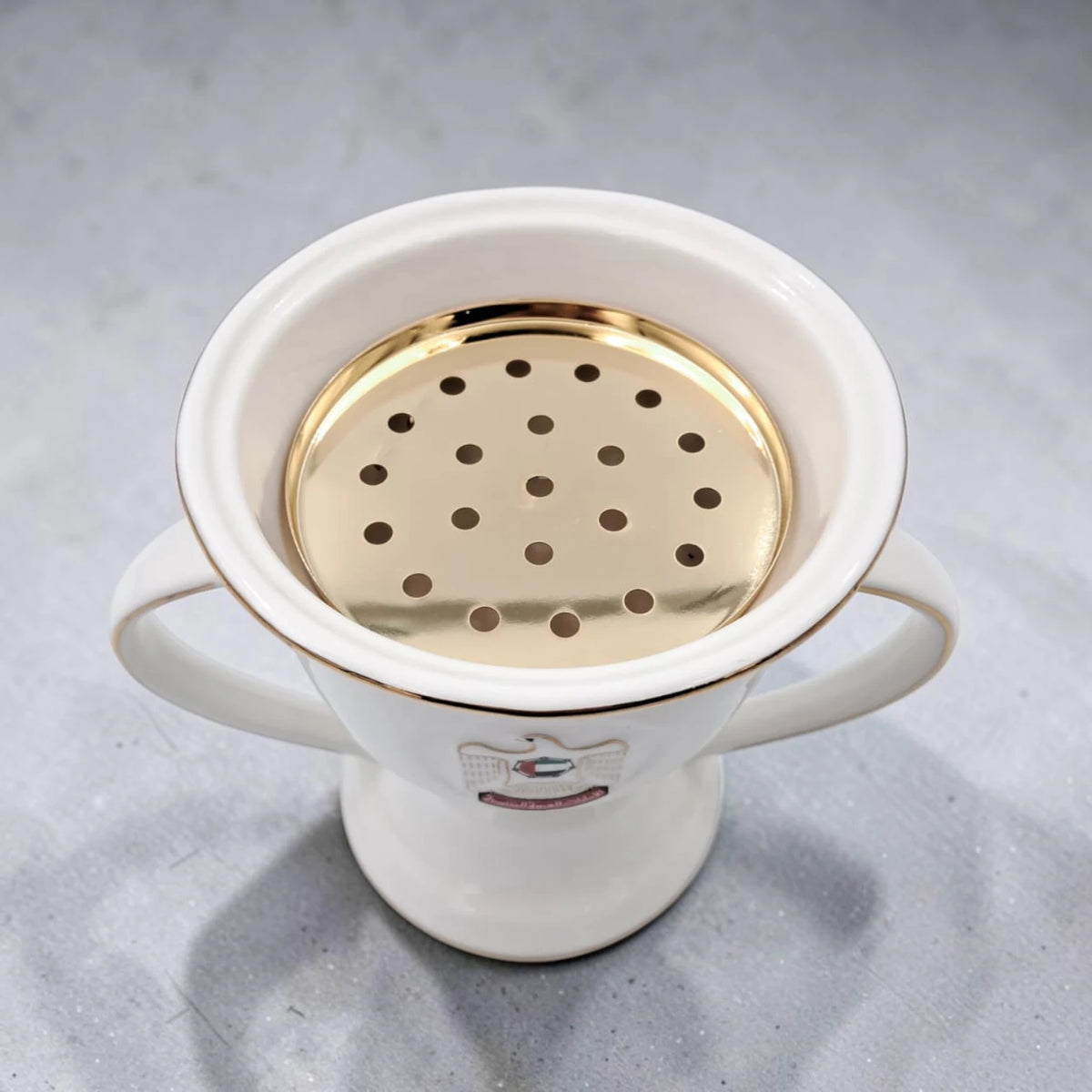 UAE National Emblem Double Handle Serving Cup with Gold Strainer Insert and Decorative Rim (13H x 16L x 12W CM) - Damoo