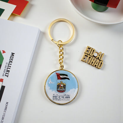 UAE “Spirit of the Union” National Day Keychain – Round Gold Metal Key Ring with Flag & Emblem Design | Patriotic Souvenir Gift for UAE National Day, 9.5cm x 3.5cm - Damoo