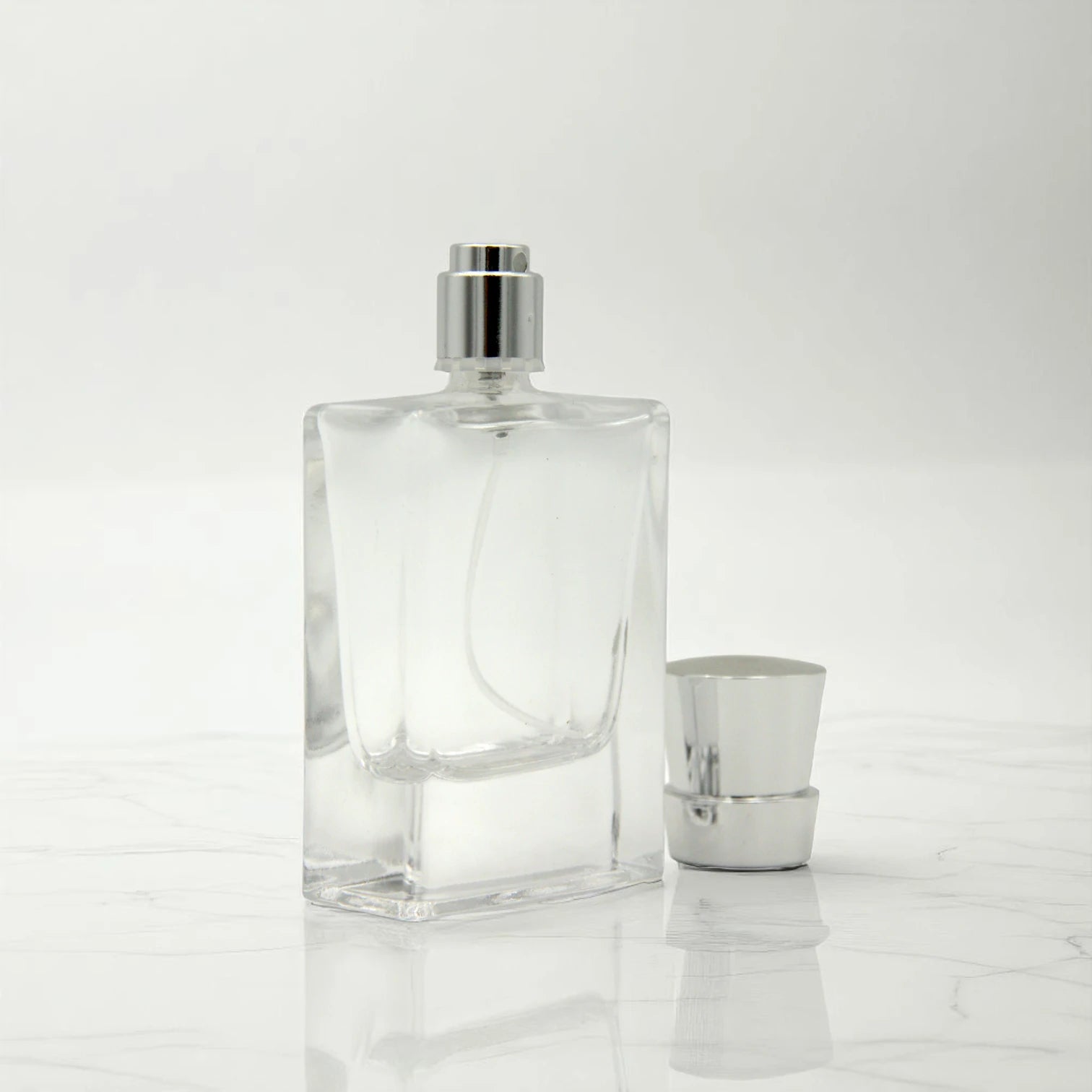 Clear Empty Perfume Bottle 50ML – Refillable Spray Glass Bottle with Silver Cap | Refillable Bottle for Perfume, Oils & Sprays - Damoo