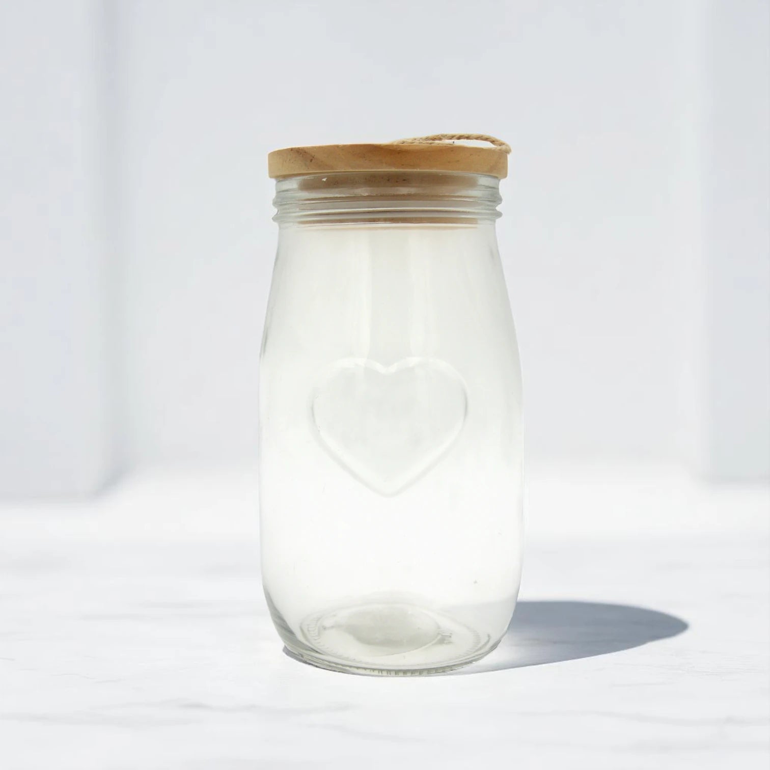 Clear Glass Storage Jar with Heart Emboss & Wooden Lid – 1400ML - Decorative Airtight Canister with Rope Handle | Ideal for Pantry, Bathroom, or Gift Packaging - Damoo