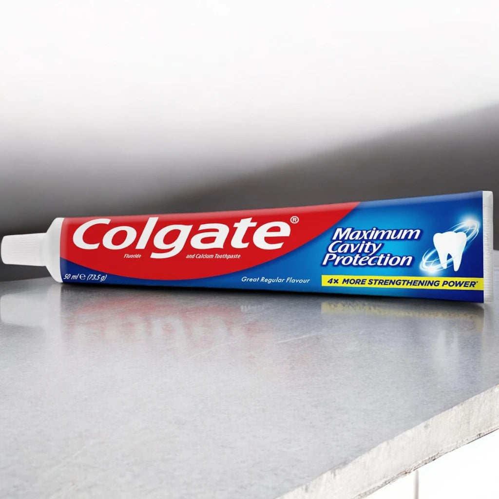 Colgate Fluoride Toothpaste Regular Mint 50ml – Cavity Protection & Long-Lasting Fresh Breath for Adults - Damoo