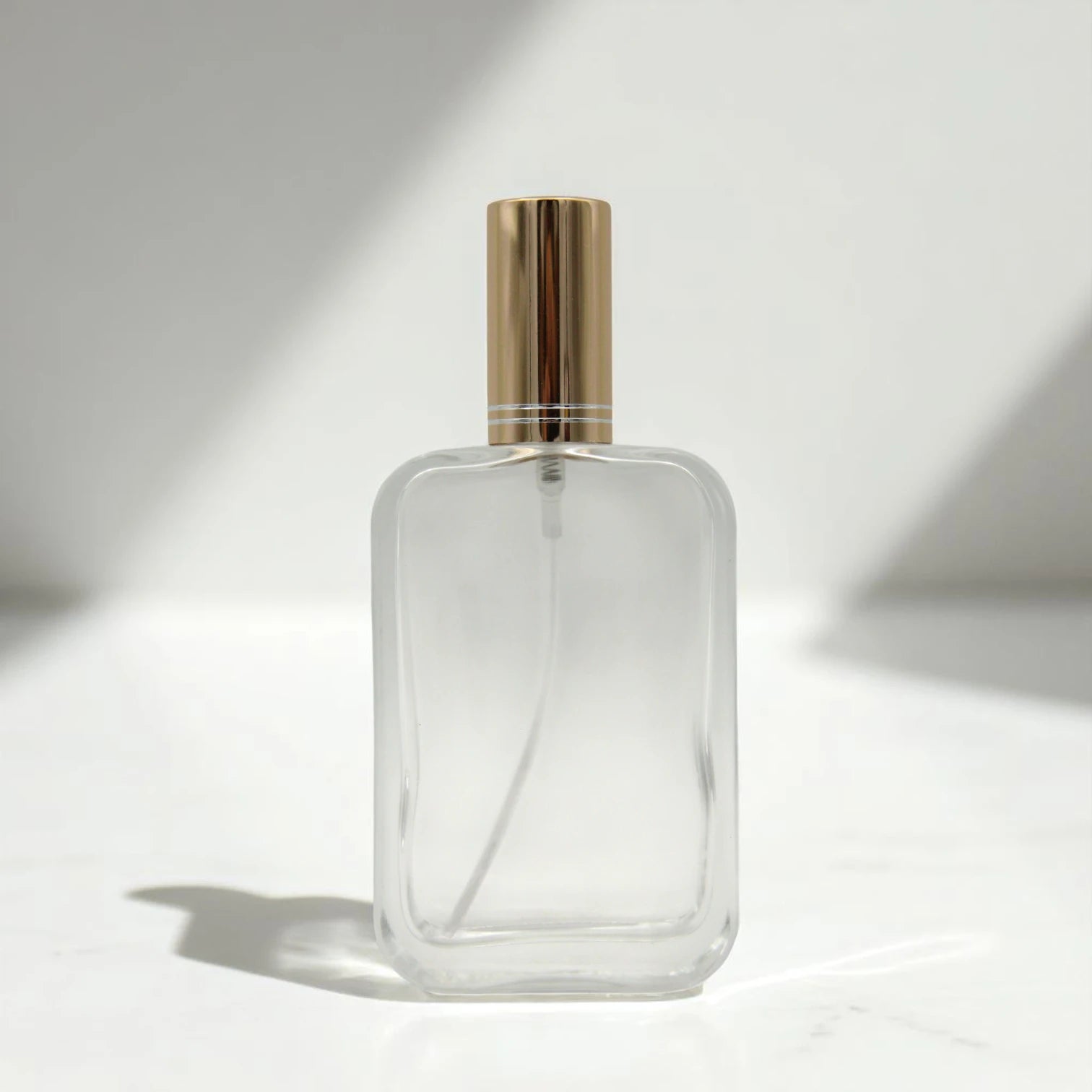 Empty Glass Perfume Bottle 100ML – Clear Refillable Spray Bottle with Smooth Edges & Gold Cap | For Perfumes, Sprays & Essential Oils - Damoo