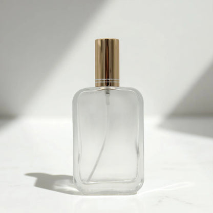 Empty Glass Perfume Bottle 100ML – Clear Refillable Spray Bottle with Smooth Edges & Gold Cap | For Perfumes, Sprays & Essential Oils - Damoo