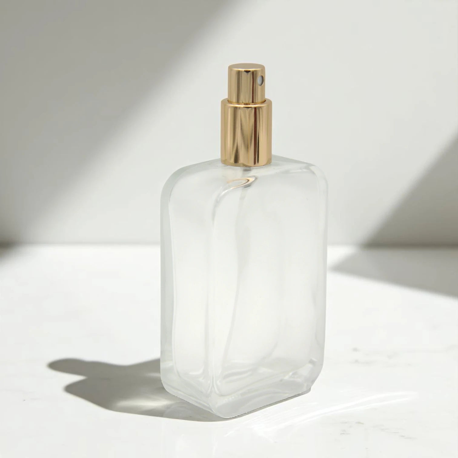 Empty Glass Perfume Bottle 100ML – Clear Refillable Spray Bottle with Smooth Edges & Gold Cap | For Perfumes, Sprays & Essential Oils - Damoo