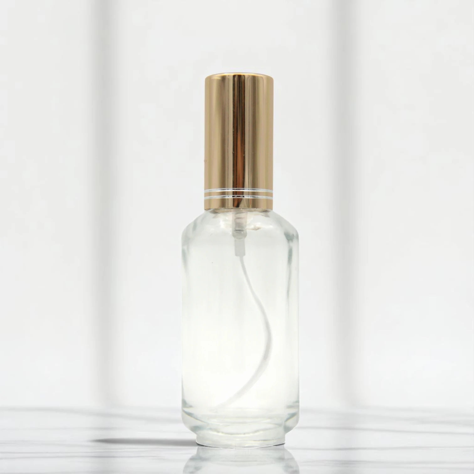 Empty Perfume Bottle 50 ML – Clear Glass Refillable Spray Bottle with Shiny Gold Cap | Portable Atomizer for Perfumes, Essential Oils & Sprays - Damoo