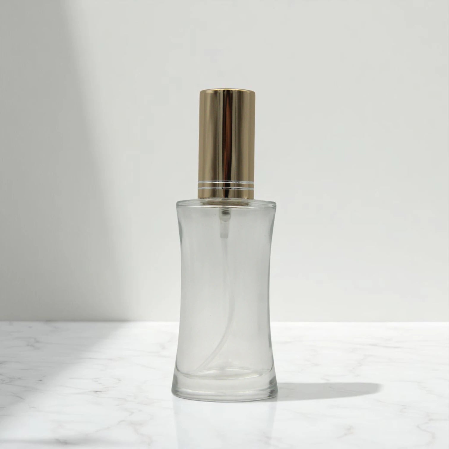 Empty Perfume Bottle 50 ML – Refillable Clear Glass Spray Bottle with Shiny Gold Cap | Elegant Atomizer for Perfumes, Sprays & Essential Oils - Damoo