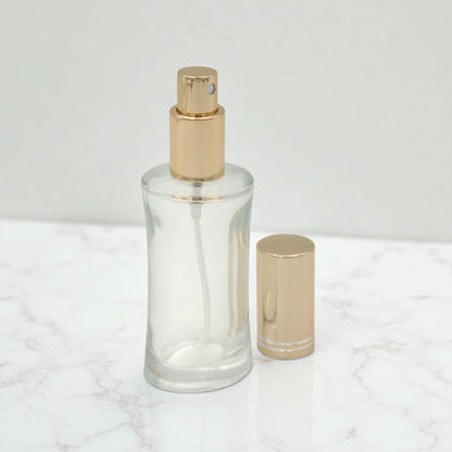 Empty Perfume Bottle 50 ML – Refillable Clear Glass Spray Bottle with Shiny Gold Cap | Elegant Atomizer for Perfumes, Sprays & Essential Oils - Damoo