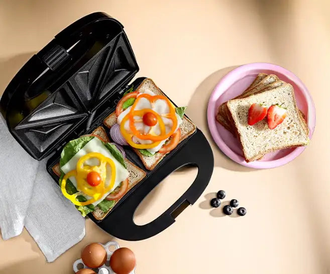 Geepas 2-Slice Sandwich Maker Grill with Non-Stick Plates, Cool Touch Handle & Automatic Temperature Control – 750W, Compact Design, Indicator Light, Easy to Clean – GSM6002 (Black, Silver) - Damoo