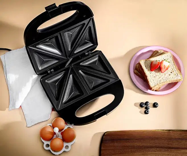 Geepas 2-Slice Sandwich Maker Grill with Non-Stick Plates, Cool Touch Handle & Automatic Temperature Control – 750W, Compact Design, Indicator Light, Easy to Clean – GSM6002 (Black, Silver) - Damoo