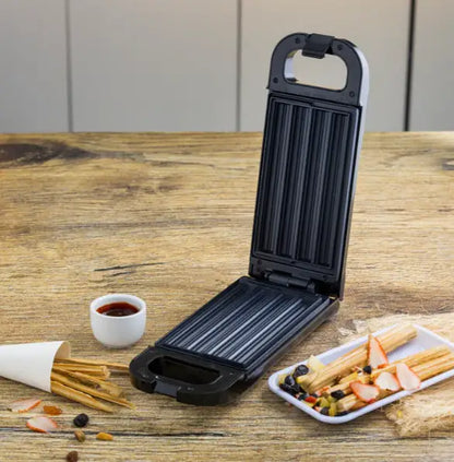 Geepas Churro Maker 750W – Non-Stick Cooking Plates, Healthy Oil-Free Baking, Lock Grip Handle, Easy to Clean, Makes 4 Churros at a Time – Perfect for Homemade Churros (Black) - Damoo