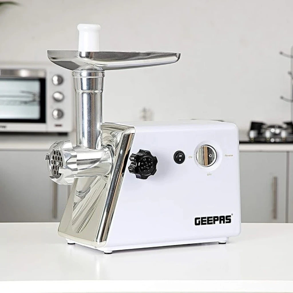 Geepas Electric Meat Grinder – 1KG/Min Capacity, Reverse Function, Stainless Steel Blades, Sausage Attachment & Food Pusher – Durable Meat Mincer – White - GMG746 - Damoo