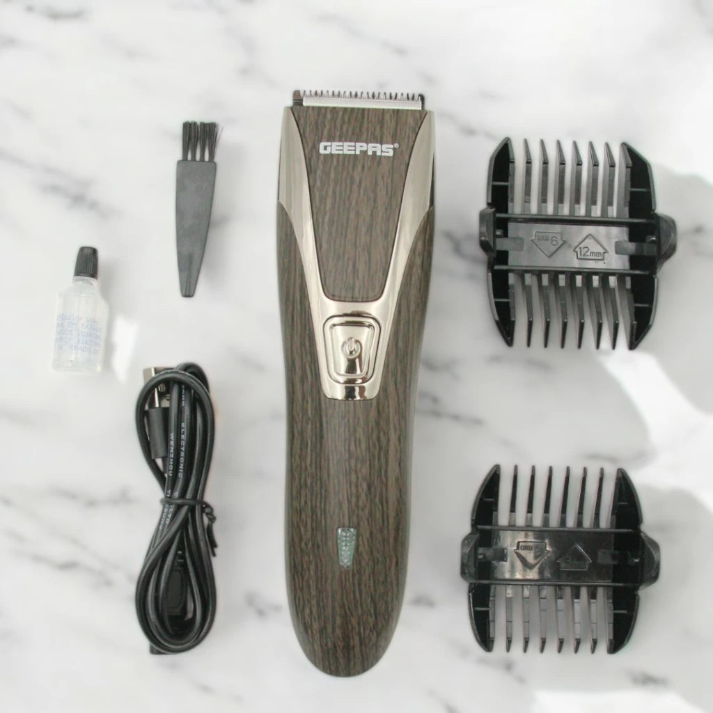 Geepas Rechargeable Cordless Hair Trimmer GTR31N for Men – Beard, Hair & Mustache Clipper with Adjustable Lengths, Stainless Steel Blade & LED Indicator – Portable Grooming Kit - Damoo