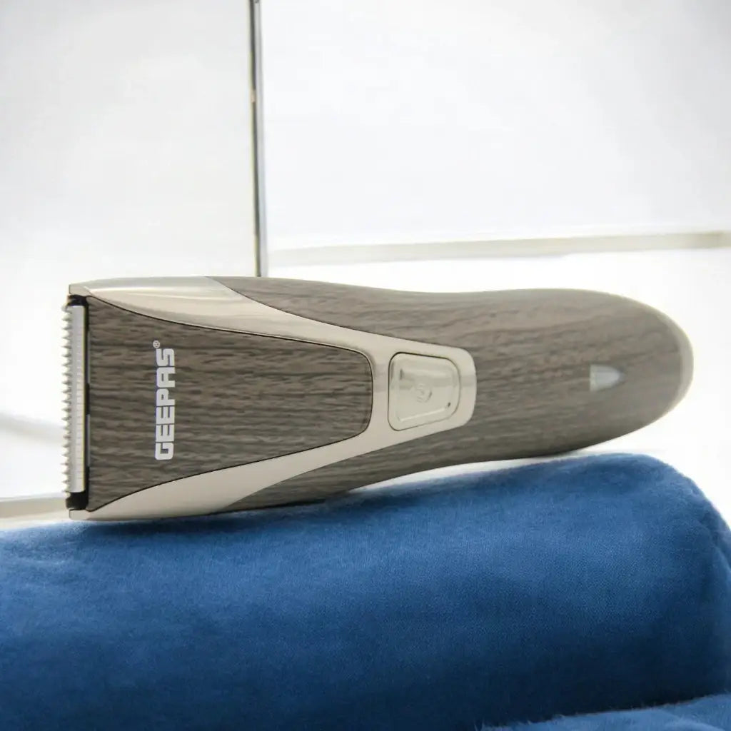 Geepas Rechargeable Cordless Hair Trimmer GTR31N for Men – Beard, Hair & Mustache Clipper with Adjustable Lengths, Stainless Steel Blade & LED Indicator – Portable Grooming Kit - Damoo
