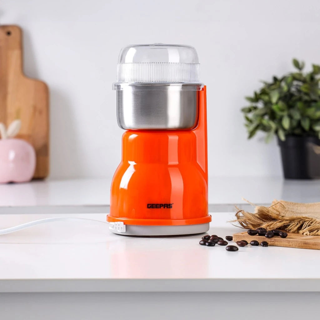 Geepas Electric Coffee Grinder – 300W Powerful Motor with Overheat Protection, Stainless Steel Blades & Bowl | Press-to-Grind Function, 150g Capacity for Coffee Beans, Spices, Nuts & More – GCG5440N – Orange - Damoo