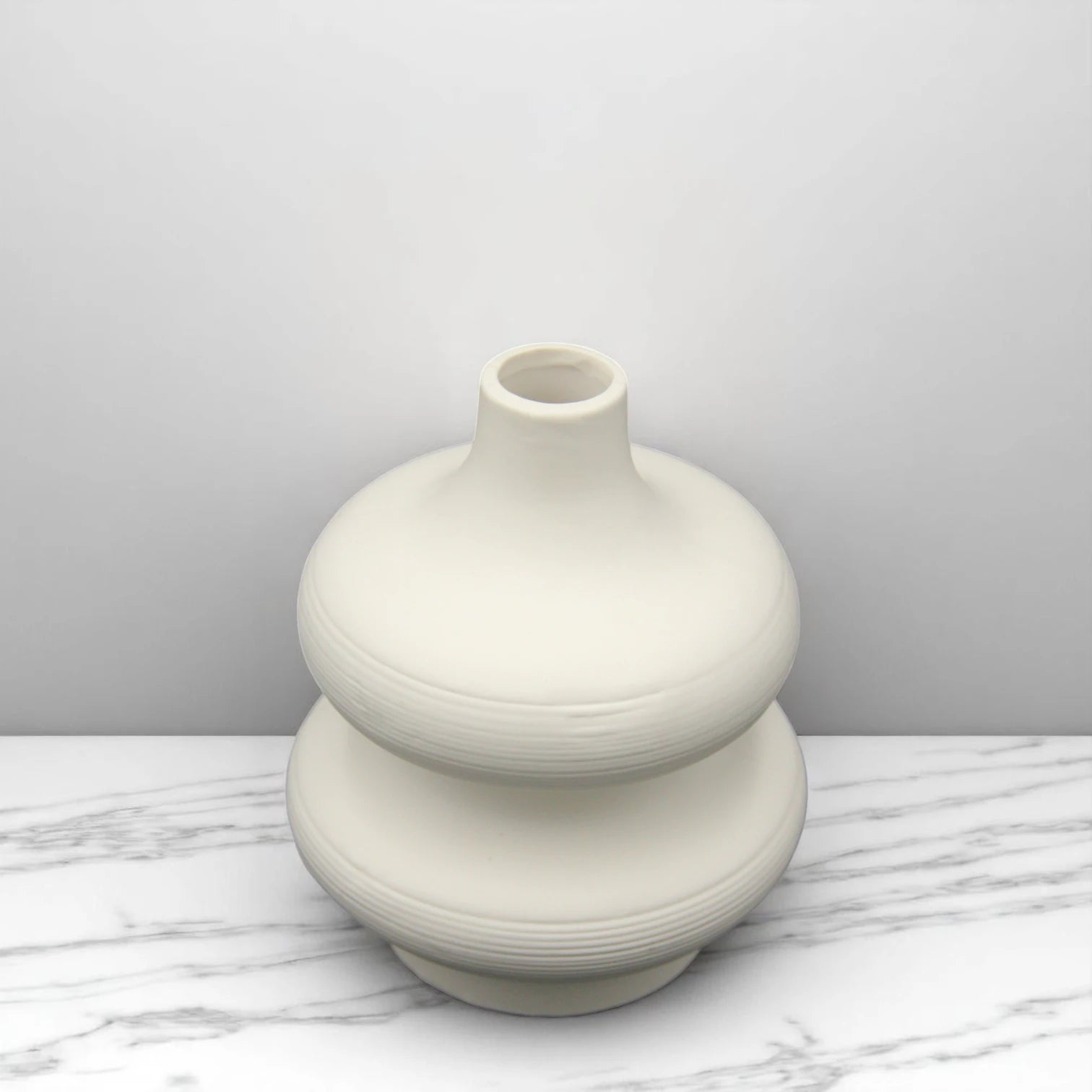 Modern Sculptural White Ceramic Flower Vase – Wavy Minimalist Design for Tabletop, Shelf, and Home Decor Styling - Damoo