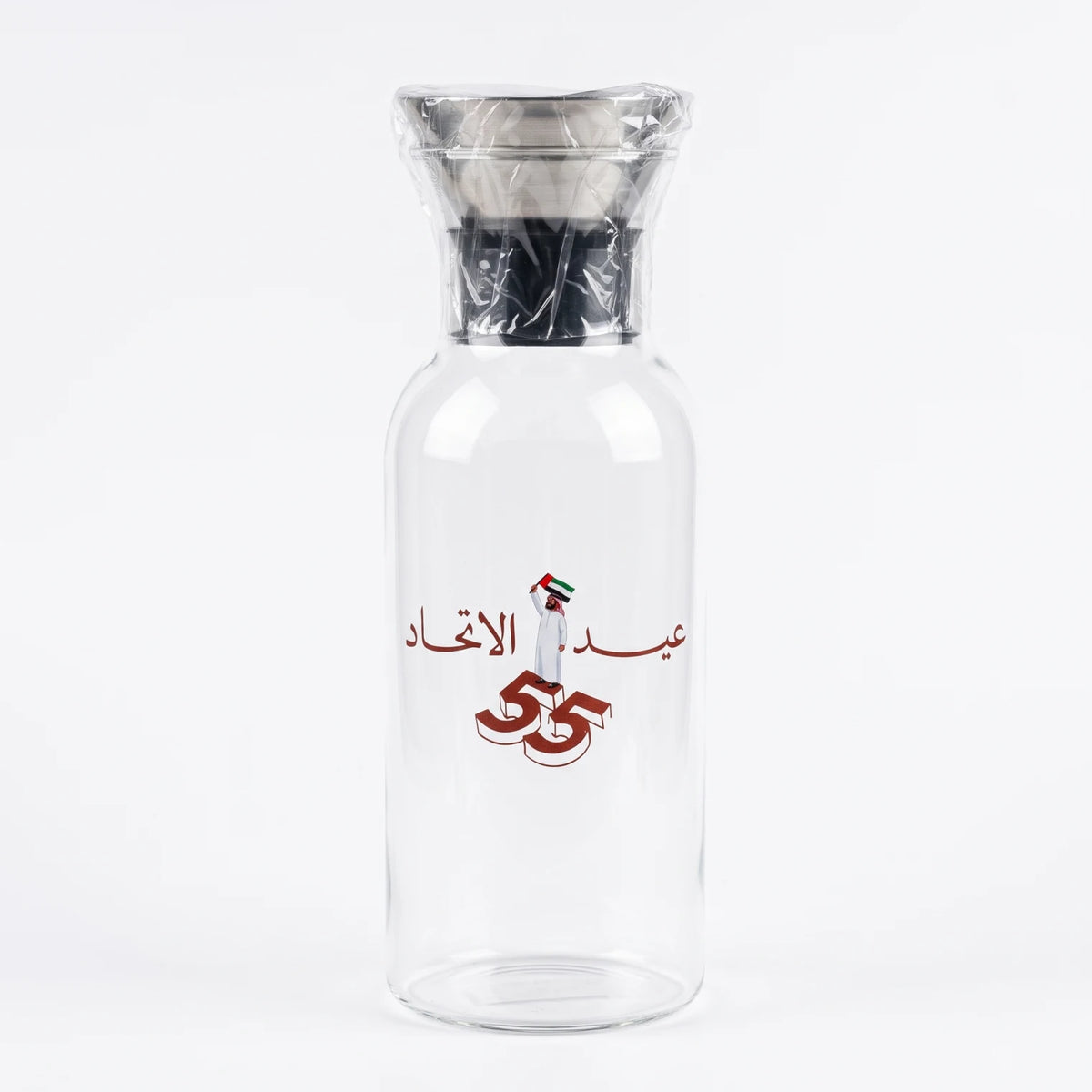 UAE National Day Glass Jug with Airtight Lid – Clear Cylindrical Bottle with Black Stopper, Arabic Decoration and UAE Flag Graphic for Festive Display