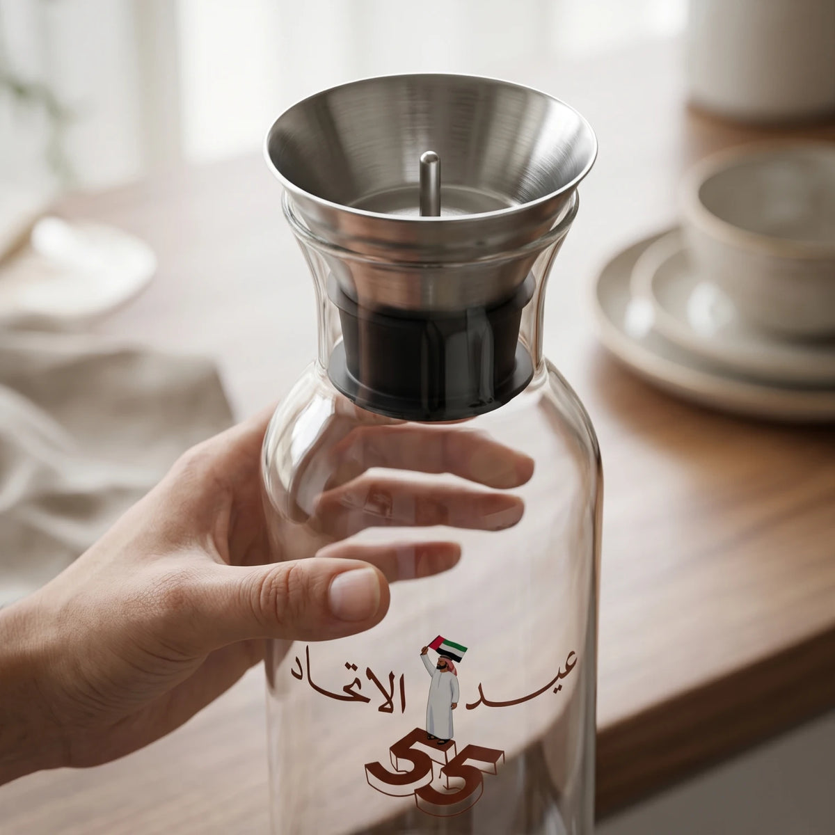 UAE National Day Glass Jug with Airtight Lid – Clear Cylindrical Bottle with Black Stopper, Arabic Decoration and UAE Flag Graphic for Festive Display