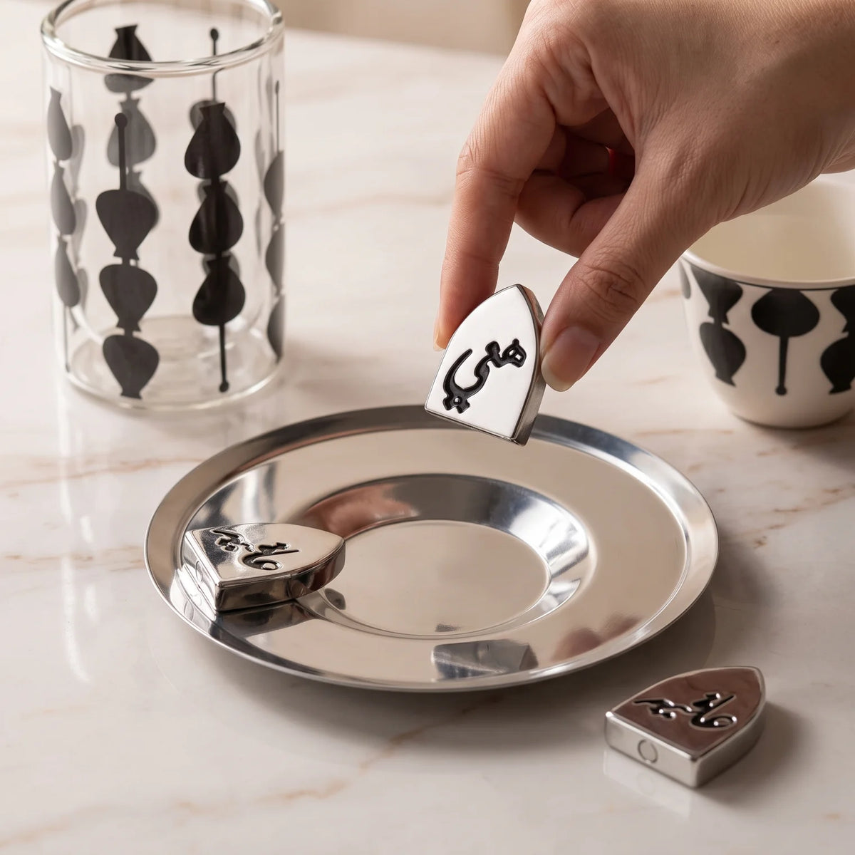 Fashion Home Elegant 18-Piece Tea and Coffee Set with Double-Wall Glass Cups, Metallic Saucers, Black Abstract Pattern and Arabic Ornaments